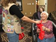 Pleasant Valley: Gabby Karber, a senior at Vancouver&#039;s iTech Preparatory High School, hands out emergency kits to seniors as part of her Girl Scout Gold Award project.