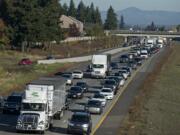 Morning traffic comes to a crawl along Interstate 205 South near the exit for Mill Plain Boulevard on Thursday morning, Oct. 24, 2019.