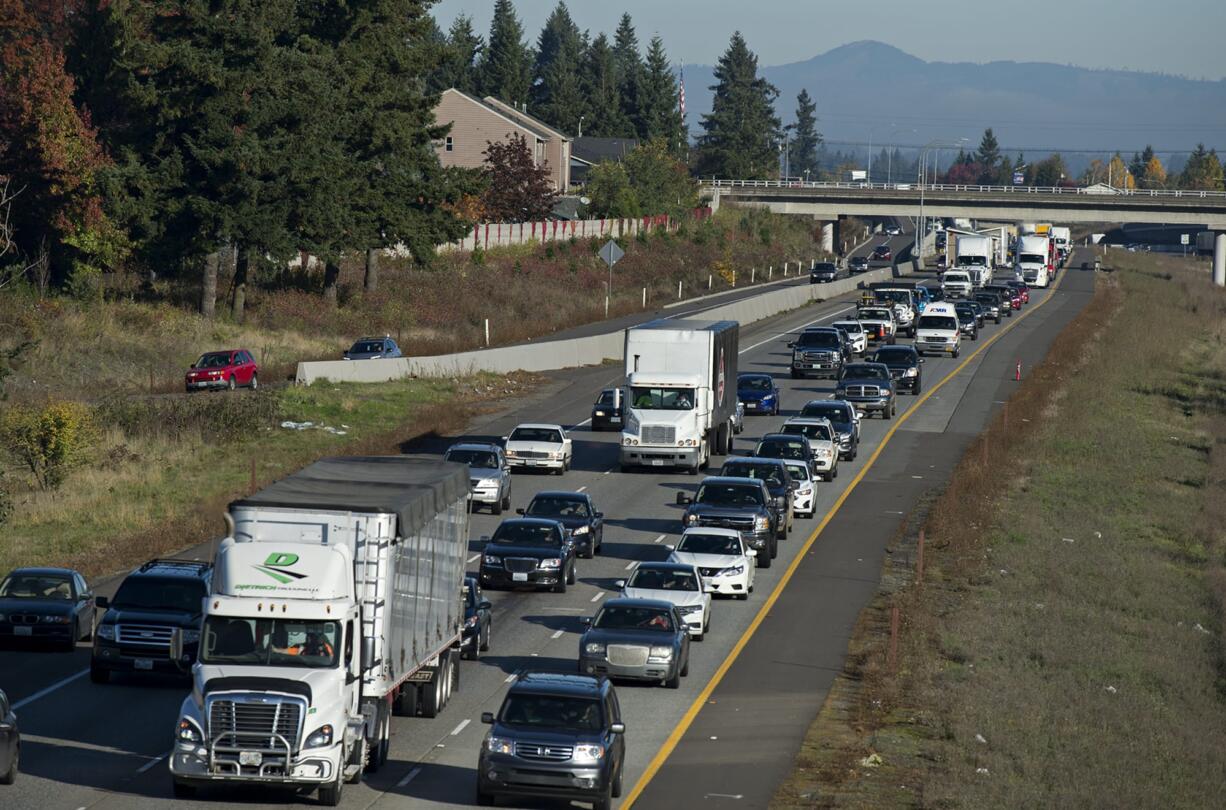 Morning traffic crawls along Interstate 205 South near the exit for Mill Plain Boulevard.