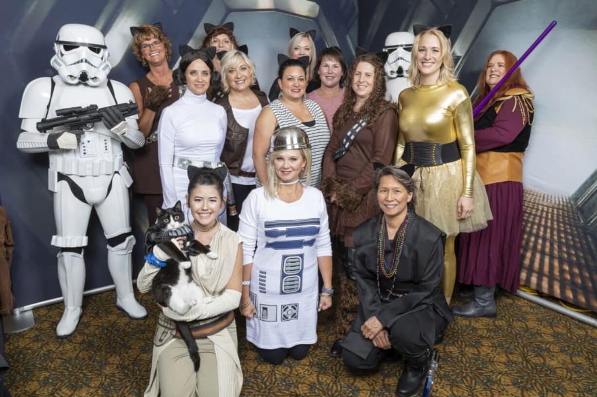 VANCOUVER MALL: Staff from Salmon Creek Plastic Surgery pose for a photo at the 11th annual fundraiser for Furry Friends at the Heathman Lodge on Sept.