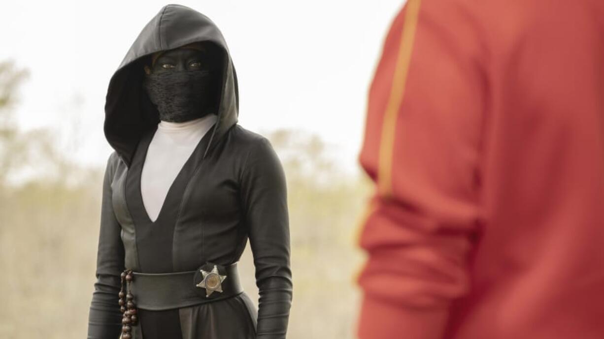 Regina King is a police officer turned masked vigilante in &quot;Watchmen.&quot; (Mark Hill/HBO)