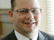 Chris Reykdal, Washington&#039;s Superintendent of Public Instruction, poses for a photo in his office, Wednesday, May 24, 2017, in Olympia, Wash. (AP Photo/Ted S.