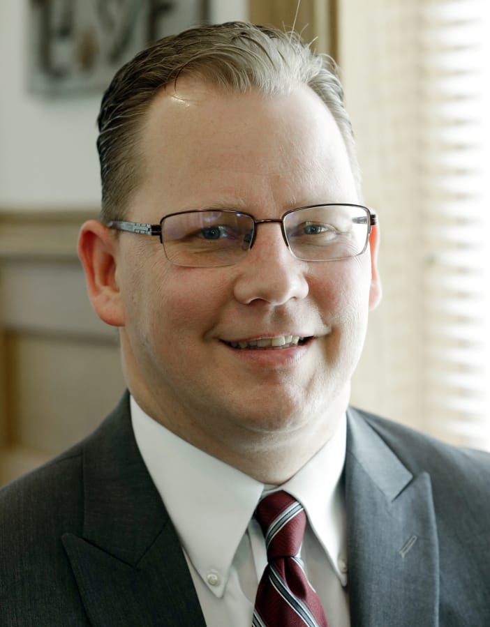 Chris Reykdal, Washington&#039;s Superintendent of Public Instruction, poses for a photo in his office, Wednesday, May 24, 2017, in Olympia, Wash. (AP Photo/Ted S.