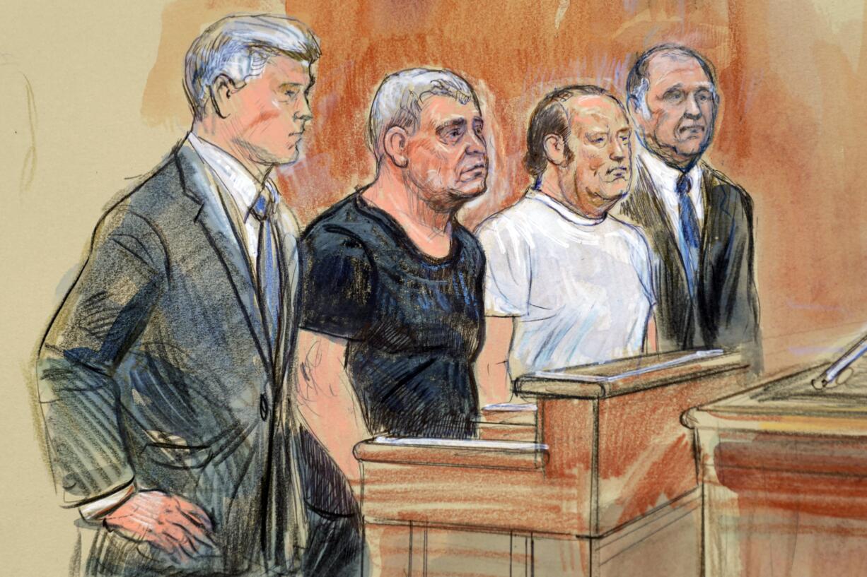 This courtroom sketch depicts from left, attorney Kevin Downing, Lev Parnas, Igor Fruman, and attorney Thomas Zehnle standing before U.S. Judge Michael Nachmanoff, at federal courthouse in Alexandria, Va., Thursday, Oct. 10, 2019. Parnas and Fruman, two Florida businessmen tied to President Donald Trump's lawyer and the Ukraine investigation, were charged with federal campaign finance violations. The charges relate to a $325,000 donation to a group supporting President Donald Trump's reelection.