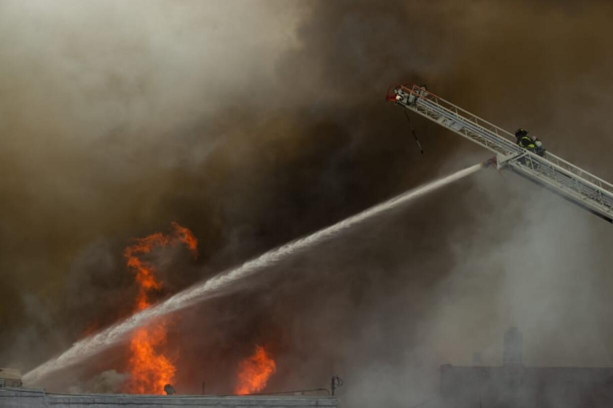 A fire breaks out on NW market street in Seattle&#039;s Ballard neighborhood on Monday, Oct. 7, 2019.