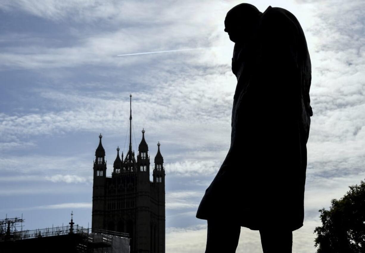 The statue of former Prime Minister Sir Winston Churchill stands in Parliament Square, in London, Monday, Oct. 28, 2019. British Prime Minister Boris Johnson says it&#039;s Parliament&#039;s fault, not his, that Britain will not be leaving the European Union as scheduled on Oct. 31. The EU has agreed to postpone Brexit until Jan. 31, after Johnson failed to get British lawmakers to ratify his divorce deal with the bloc in time to leave this week.