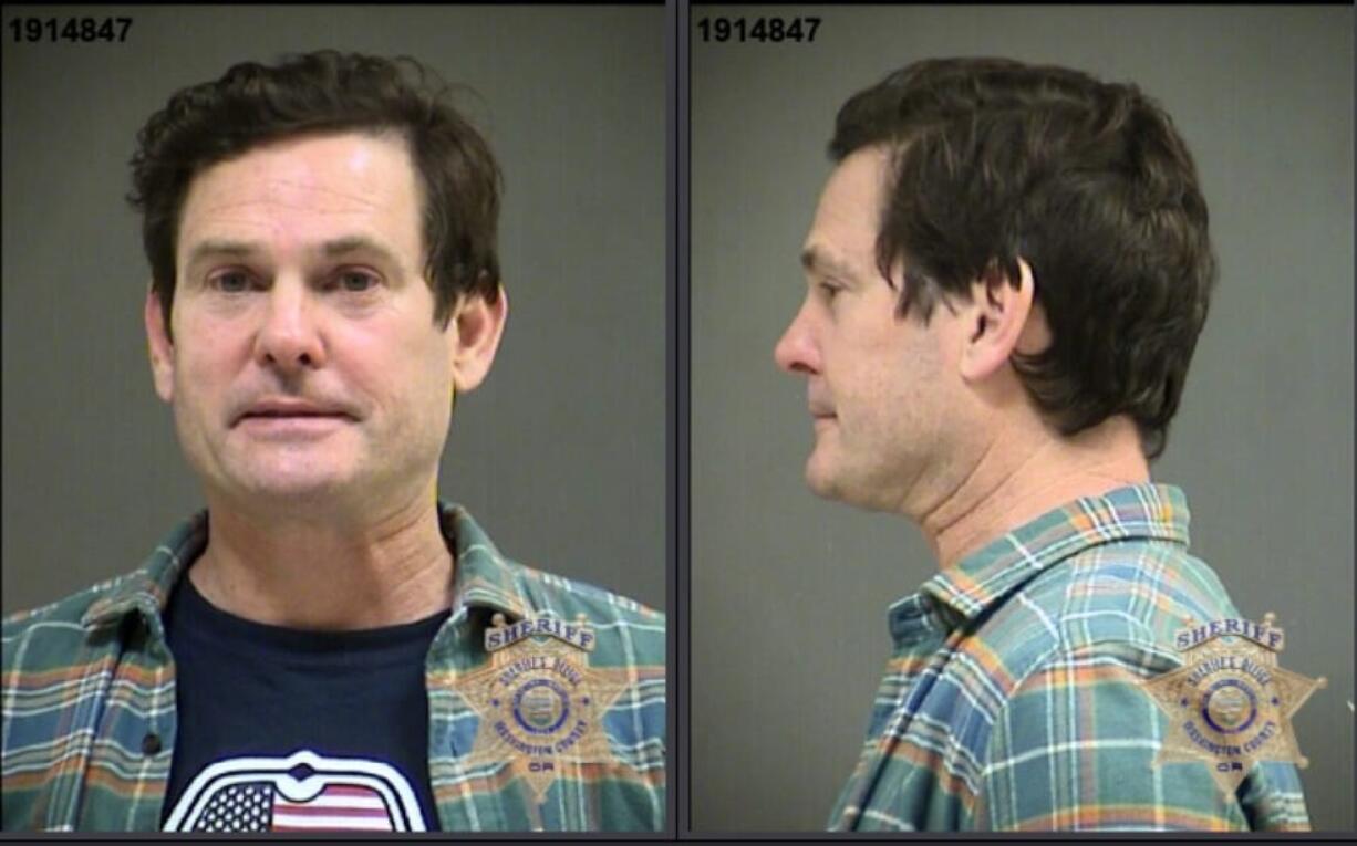 This image provided by the Washington County Sheriff's Office shows booking photos of actor Henry Thomas.  Authorities say Thomas, the actor who starred as a child in "E.T. the Extra Terrestrial" was arrested for driving under the influence in Oregon. The 48-year-old was booked into the Washington County Jail and faces the misdemeanor charge after police said they found him Monday in a stationary car.