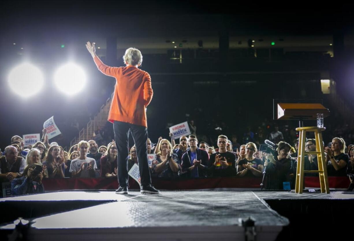 Democratic presidential candidate Elizabeth Warren addresses the crowd during her town hall meeting at Chartway Arena at the Ted Constant Convocation Center in Norfolk, Va., Friday, Oct. 18, 2019.