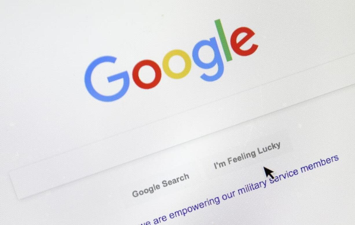 FILE - In this Aug. 28, 2018, file photo, a cursor moves over Google&#039;s search engine page, in Portland, Ore. Google is paying more attention to the small words in your searches. Google is rolling out the change to English language searches in the U.S. starting this week.