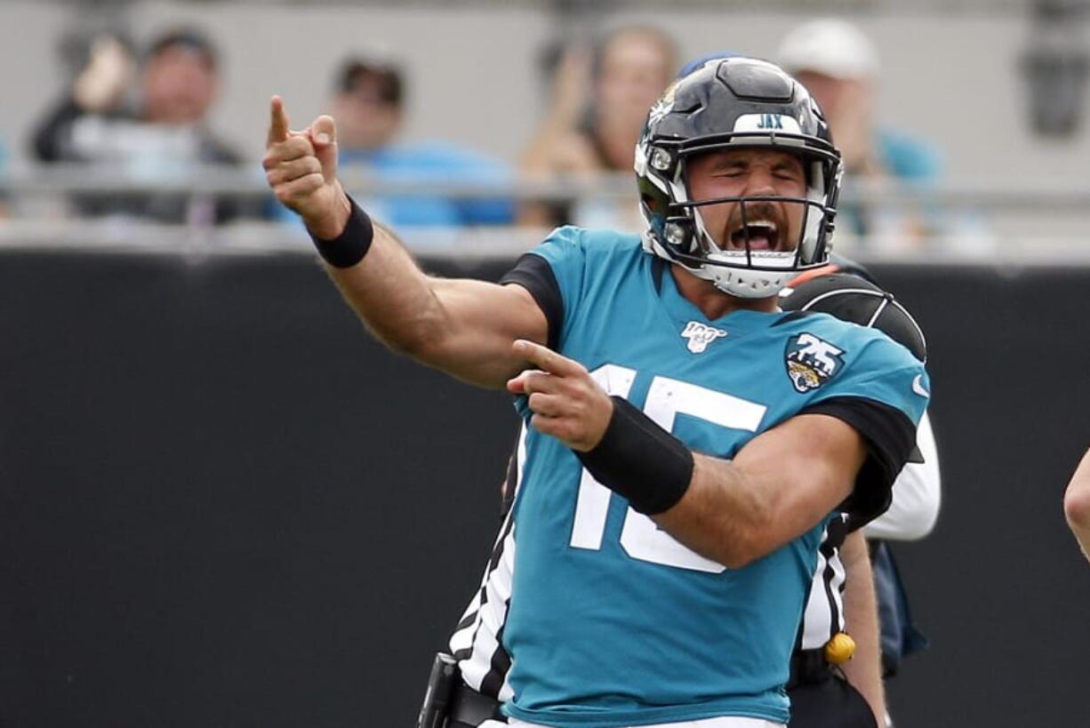 Jacksonville Jaguars quarterback Gardner Minshew II celebrates after running for a first down and drawing a penalty against the New York Jets during the second half of an NFL football game, Sunday, Oct. 27, 2019, in Jacksonville, Fla. (AP Photo/Stephen B.