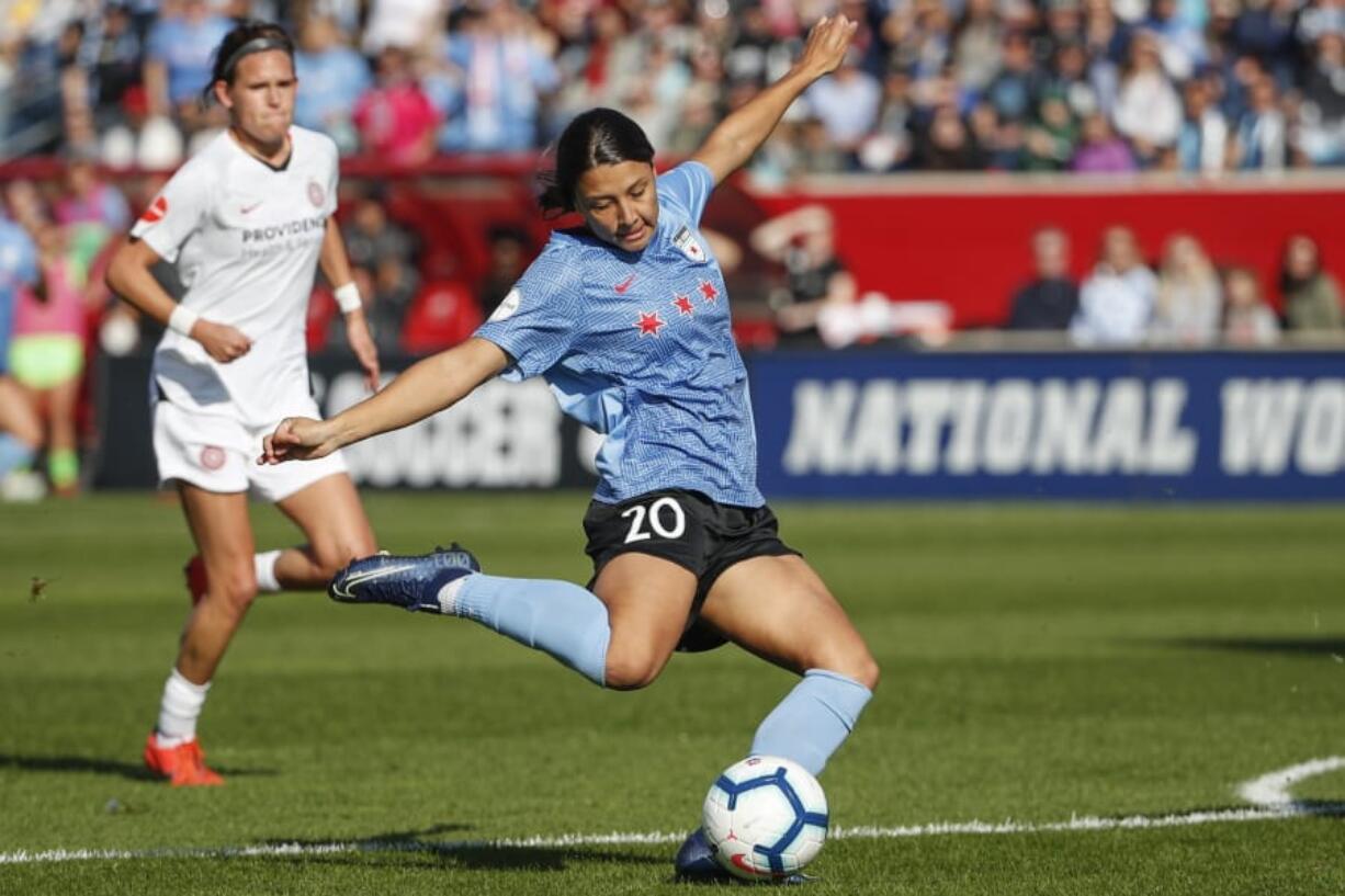 Chicago Red Stars forward Sam Kerr scores against the Portland Thorns FC during the first half of an NWSL playoffs semi-final soccer match Sunday, Oct. 20, 2019, in Bridgeview, Ill.