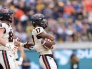 Oregon State wide receiver Isaiah Hodgins (17) reacts with tight end Teagan Quitoriano (84) after scoring a touchdown against the California  in the second quarter of an NCAA college football game in Berkeley, Calif., Saturday, October 19, 2019.