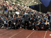 The Union football team listens to head coach Rory Rosenbach after a 56-7 win over Heritage on Friday at McKenzie Stadium.