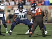 Seattle Seahawks offensive tackle George Fant (74) plays against the Cleveland Browns defensive end Myles Garrett (95) on Oct. 13 in Cleveland.