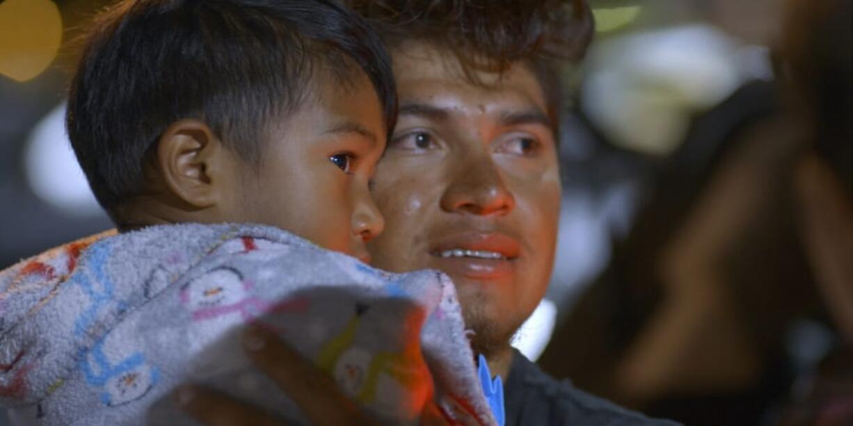 Luis Diaz, a migrant from Honduras who is living in the U.S. illegally, holds his son Noah in Kansas City, Mo., before the child and his mother are deported, in a scene from the six-episode docuseries &quot;Living Undocumented&quot; currently streaming on Netflix.