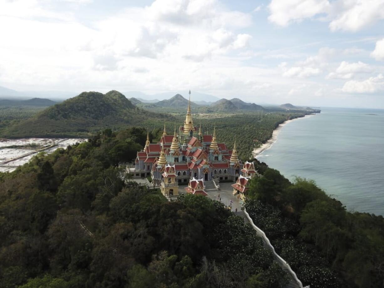 This June 15, 2019 photo shows Wat Tang Sai, a Buddhist temple perched atop Thong Chai Mountain in Ban Krut in the Prachuap Khiri Khan province of Thailand. You won&#039;t find the party scene of Phuket or Pattaya in laid-back Ban Krut, but you will get one of the cleanest and quietest stretches of white sand within driving distance of the capital.