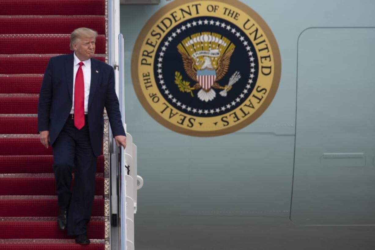 President Donald Trump walks from Air Force One at Andrews Air Force Base, Md., following a trip to South Carolina on Friday, Oct. 25, 2019.