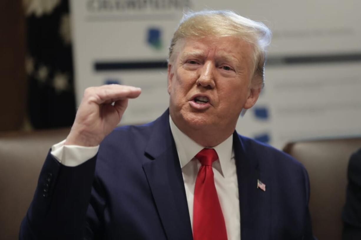 President Donald Trump speaks during a Cabinet meeting Monday in the Cabinet Room of the White House in Washington.