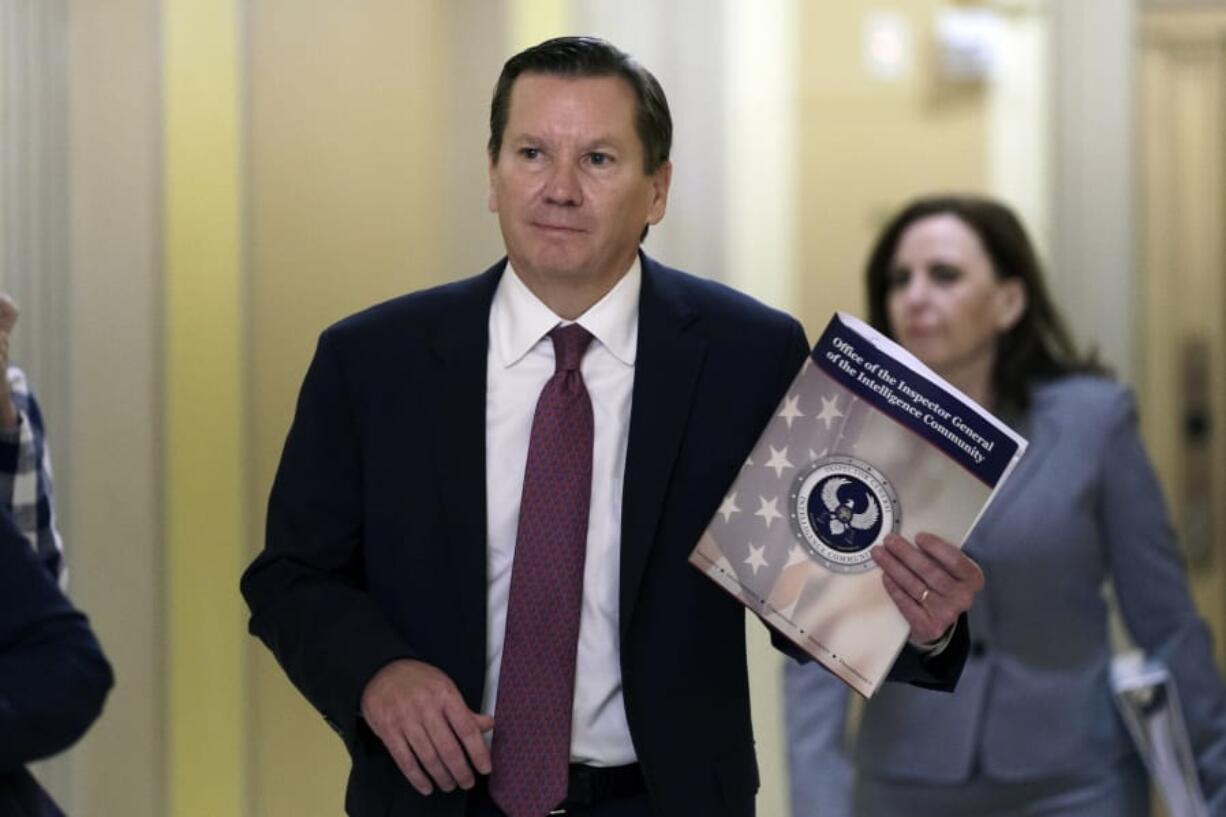 Michael Atkinson, the inspector general of the intelligence community, arrives at the Capitol where he will go behind closed doors to be questioned about the whistleblower complaint that exposed a July phone call the president had with Ukrainian President Volodymyr Zelenskiy in which Trump pressed for an investigation of Democratic political rival Joe Biden and his family, at the Capitol in Washington, Friday, Oct. 4, 2019. (AP Photo/J.