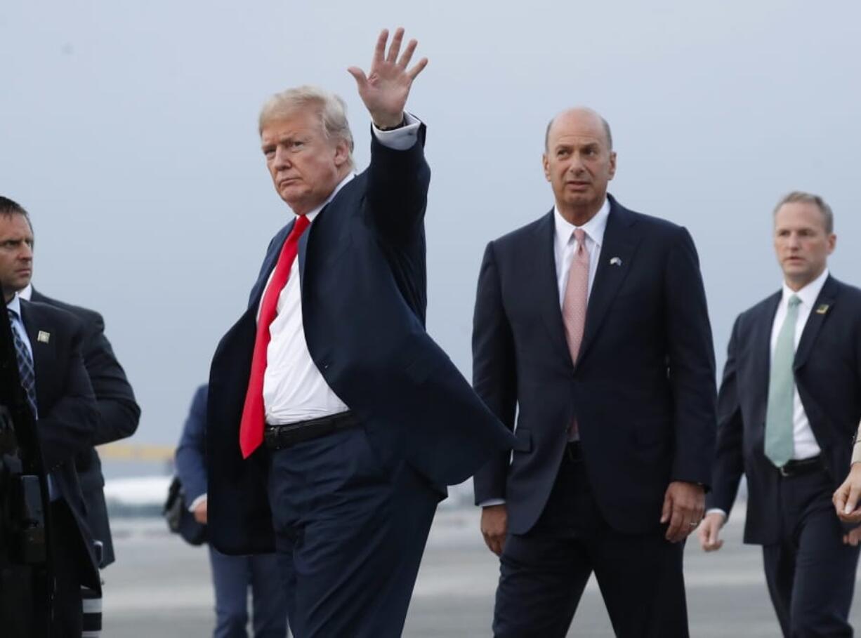 FILE - In this Tuesday, July 10, 2018, file photo, President Donald Trump is joined by Gordon Sondland, the U.S. ambassador to the European Union, second from right, as he arrives at Melsbroek Air Base, in Brussels, Belgium. According to text messages released the first week of October 2019 by House investigators, Ambassador Gordon Sondland and Kurt Volker, a former special envoy to Ukraine, discussed Trump wanting to press Ukrainian President Volodymyr Zelenskiy to investigate Trump&#039;s Democratic political rival Joe Biden and his family. The House Intelligence Committee is scheduled to meet in private with Sondland.