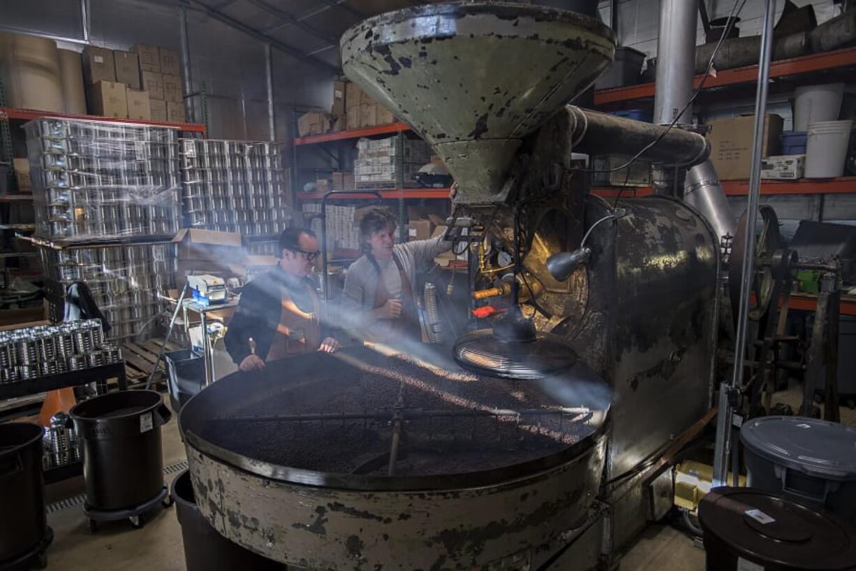 Mocha-Java beans are seen in an antique coffee roaster in Yacolt on Friday afternoon, Oct. 11, 2019.