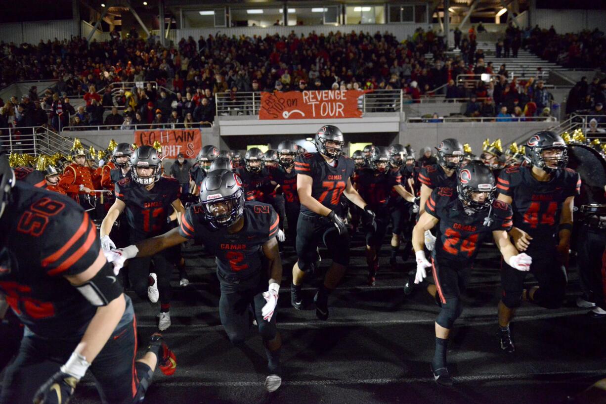 The Camas Papermakers enter Doc Harris Stadium to start the second half of a game against Union in Camas on Friday night, November 1, 2019. Camas beat Union 28-14.