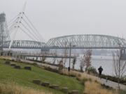 Battle Ground resident James Fields takes the fog in stride while running near the Grant Street Pier as stagnant air causes the fall air to linger Monday morning, Nov. 4, 2019. Fields, who works in Vancouver, said he was been enjoying the sport since junior high and the cool, seasonal temperatures were a bonus for joggers. "This is a beautiful time to run," he said.