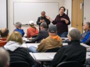 Camas Mayor Shannon Turk speaks to a packed crowd at a Camas ward meeting at the Camas-Washougal Fire Department Station 42 Thursday night. It was the first chance residents had to speak to a bulk of the city council since residents resoundingly defeated a $78 bond measure in Tuesday&#039;s election.