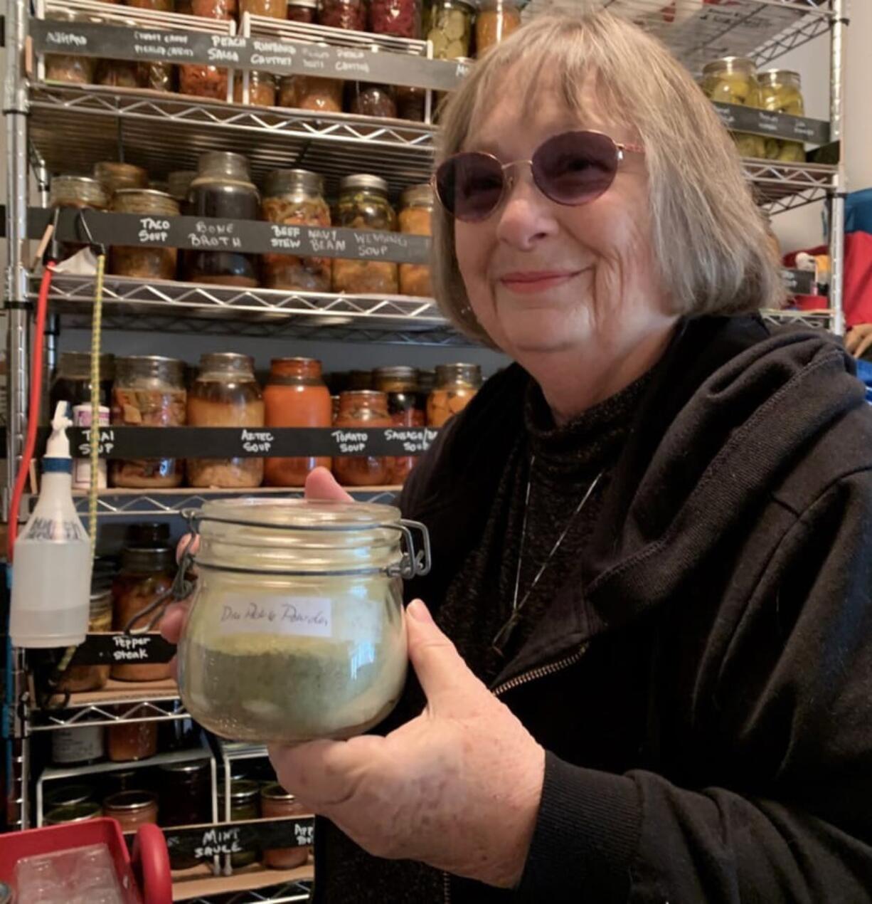 Judith Seifert of Battle Ground in her pantry of food she has preserved.