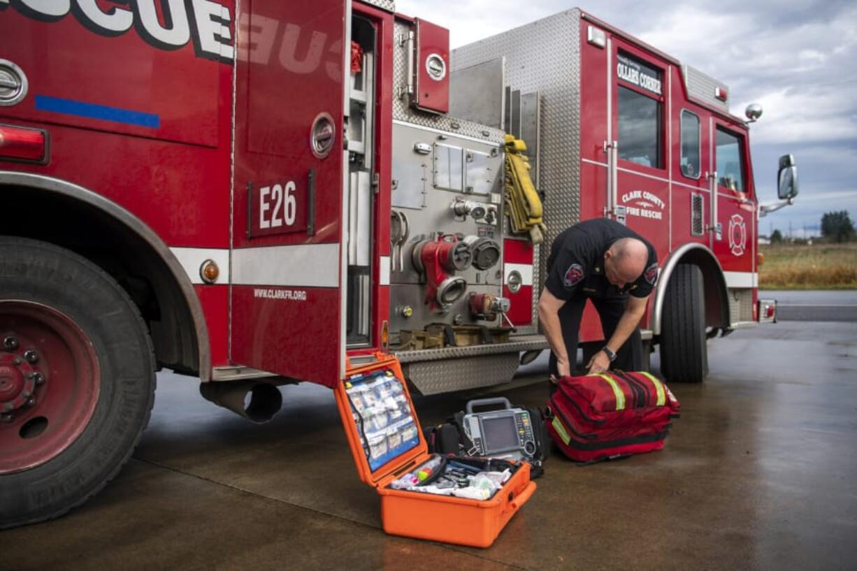 Clark County Fire &amp; Rescue Chief John Nohr describes the emergency medical equipment stored on the fire engines at Fire Station 21 in Ridgefield.