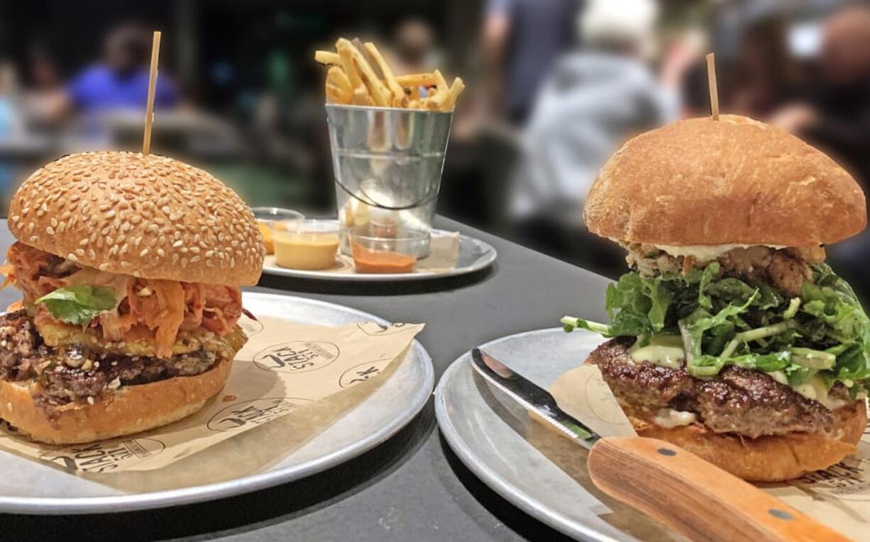 Big Kahuna, left, and Truffle Mushroom burgers at Stack 571.