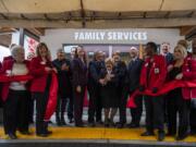Local officials and Salvation Army leaders cut the ribbon during the Nov. 15 grand opening for the newly expanded Salvation Army campus in east Vancouver.