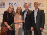 CENTRAL PARK: Clark College Foundation&#039;s Kathy Chennault, from left, Rhonda Morin, Eric Merrill, and Daniel Rogers accept the 2019 Spotlight Award from the Oregon chapter of the Public Relations Society of America.