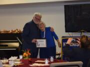 ORCHARDS: Dan Murphy of the Broadway Rose Theater and Vivian Peterson, a member of Cascade Park Kiwanis, celebrate Murphy&#039;s Distinguished Service Award at the Cascade Park Kiwanis 11th Annual Fall Festival of Service.