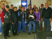 Esther Short: Members of the Labor Roundtable of Southwest Washington present a check to the Clark County chapter of the National Korean War Veterans Association Inc., the Richard L.