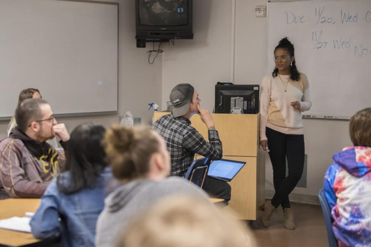 Adjunct professor Karina Bjork leads students at Clark College while teaching an interpersonal communications class in Hanna Hall on Wednesday evening. Bjork is one of the many adjunct professors at Clark College who travels between campuses, giving several lectures on a given day. Bjork ping-ponged between Clark and Clackamas Community College this day.