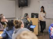 Adjunct professor Karina Bjork leads students at Clark College while teaching an interpersonal communications class in Hanna Hall on Wednesday evening. Bjork is one of the many adjunct professors at Clark College who travels between campuses, giving several lectures on a given day. Bjork ping-ponged between Clark and Clackamas Community College this day.