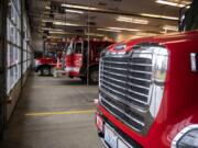 Clark County Fire &amp; Rescue vehicles are seen Monday at Fire Station 21 in Ridgefield.