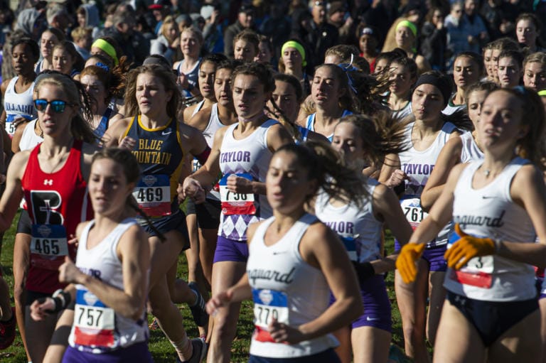 Runners break away from the starting line of the women’s 5 kilometer race during the NAIA Cross Country National Championships on Friday morning, Nov. 22, 2019.