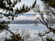 Picturesque Vancouver Lake, as seen from Northwest Lakeshore Avenue on Friday, could receive some state help to address long-standing water quality problems.