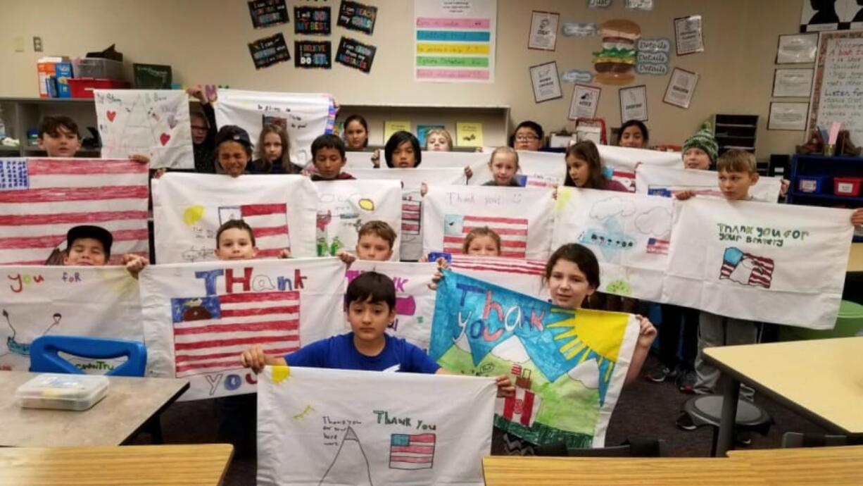 East Mill Plain: Students in Anna Ball&#039;s class at Mill Plain Elementary School with the pillowcases they decorated to send to troops as part of Operation Pillow Talk.