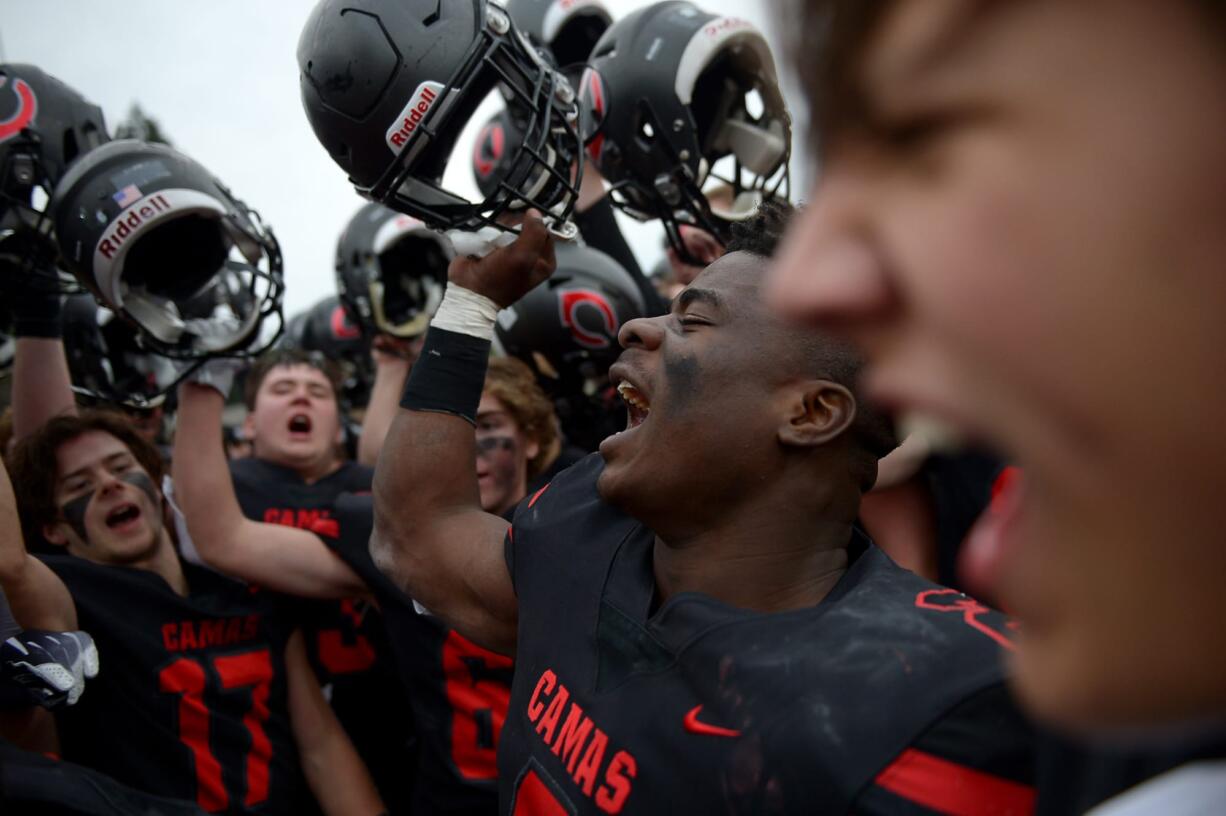 The Camas Papermakers celebrates their win against Mount Si at McKenzie Stadium on Saturday afternoon, November 30, 2019. Camas beat Mount Si 35-14 to move on to the 4A state title game.