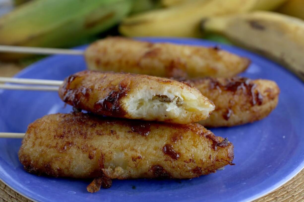 Fried banana with brown sugar, on a stick. (Hillary Levin/St.