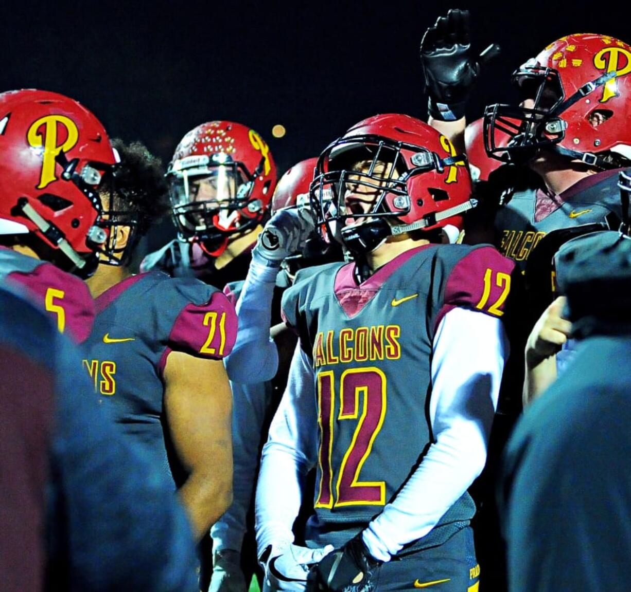 Prairie senior Zack Brown screams in celebrations after the Falcons&#039; 42-14 win over Evergreen on Friday.