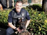 Officer Christopher Douville and Doc both recently join the Vancouver Police Office K-9 Unit. Doc, a 2-year-old Dutch Shepherd, is named in honor of Douville's father.