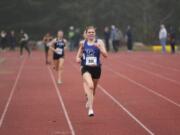 Clark College runner Paige Neff heads for the finish line to place 10th overall at the NWAC cross country champions on Monday, Nov. 20, 2019, at Saint Martin?s University in Lacey.