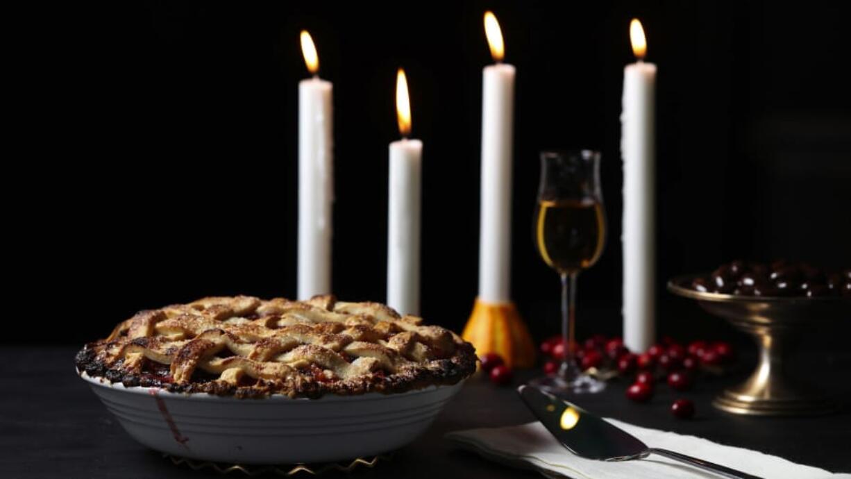 Pears and cranberries partner for a fall-forward pie of flavor and textural contrasts, with fresh and dried versions of the berries playing off each other.