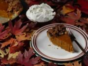 This version of pumpkin pie is topped with a nut-free ginger praline, made from ginger snap cookies and crystallized ginger.