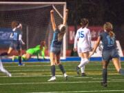 Hockinson's Megan Meindersee lifts her arms in celebration after scoring the Hawks' second goal in a 2-0 victory over Ridgefield in the 2A State semifinals Friday at Shoreline Stadium.