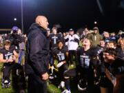 Hockinson Coach Rick Steele tells the team how proud he is of them as they celebrate their 29-28 win over Lakewood in a quarterfinal game on Saturday, Nov. 23, 2019, at Battle Ground District Stadium. (Molly J.